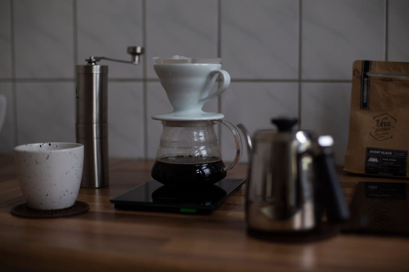 A cup on a scale with a timer